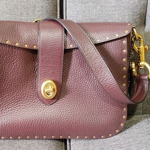 Coach Oxblood Page 27 with Rivets